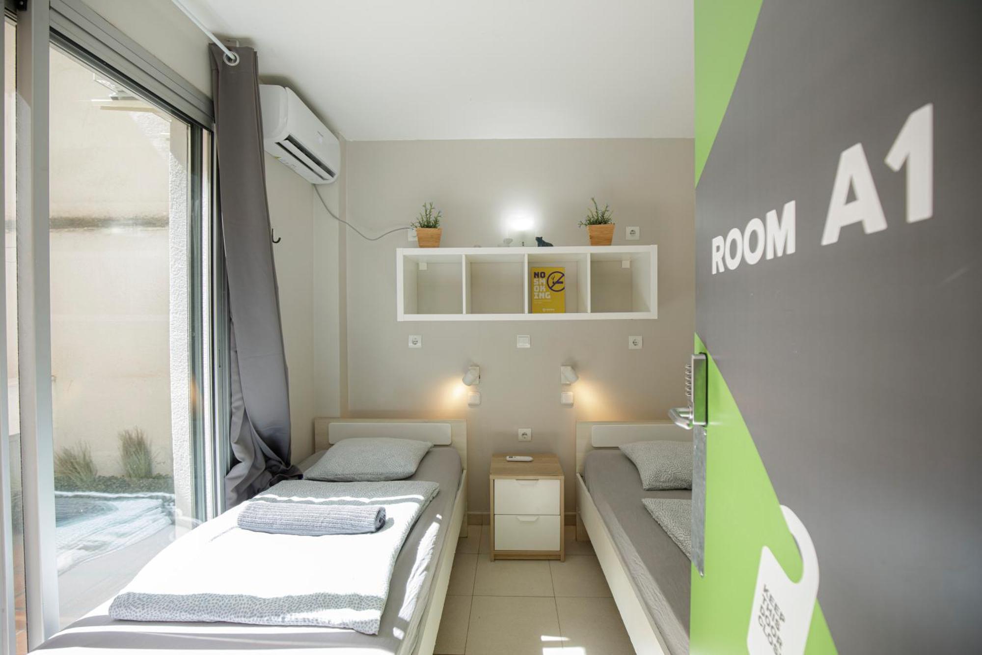 Habitación Doble con baño compartido - 2 camas